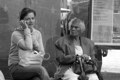 Aboriginal lady with girl on phone