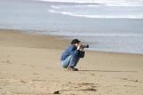 taking pictures of the surf