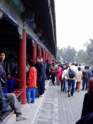 Locals hanging out near the East Gate to sing, play cards and have fun.