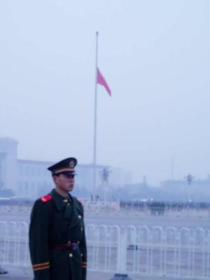 Flag raising at Tian An Men square at dawn.