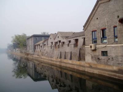 Houses across the moat from the palace.