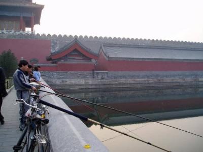 Fishing the palace moat.