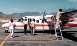 Nancy Neel with Lewis B. Bud Maytags Turbo Commander N8LB and friends during refueling at La Paz, Mexico