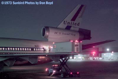 1973 - United Airlines DC10-10 N1806U with cabin services truck at night
