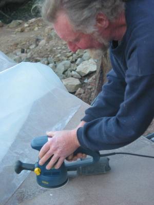 sanding the floor