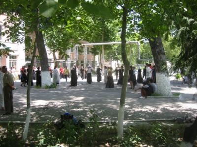 school yard practizing uzbek dance