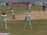 Cricket Ntini  flies the ball past Sarwan