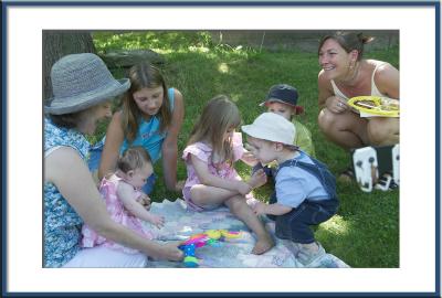 The baby is the center of the social circle.