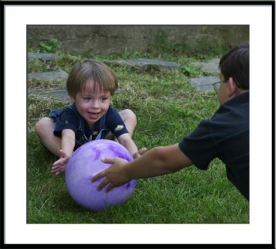 Nick and Tris play ball.