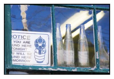Is this sign designed to convince us that there are things of value in this antique store? Maybe!