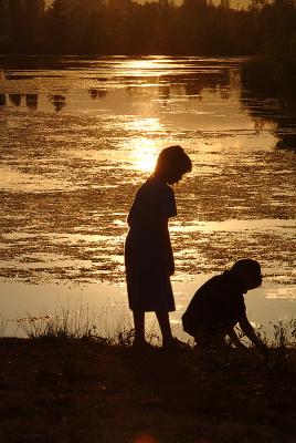 Playing by the lake