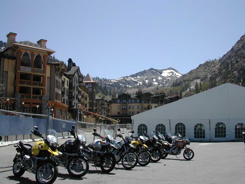 BMWs with Oympic Village and Squaw Peak in the background