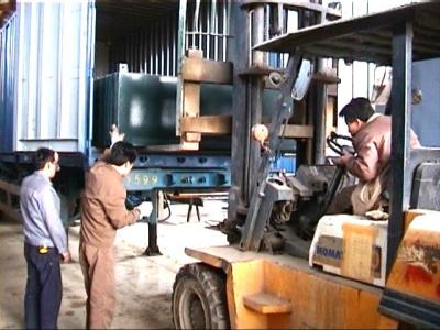 loading the top part into the container