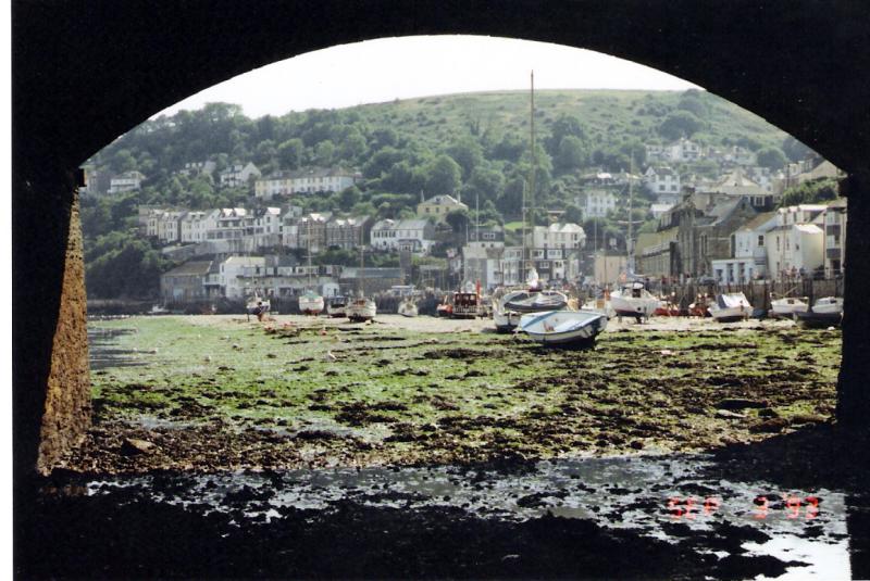 Arches of Looe bridge, Cornwall, at low tide, towards the sea