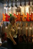 Sue Carson in front of the Custom Shop Wall