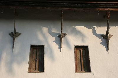 Windows of Temple at foot of Phu Si