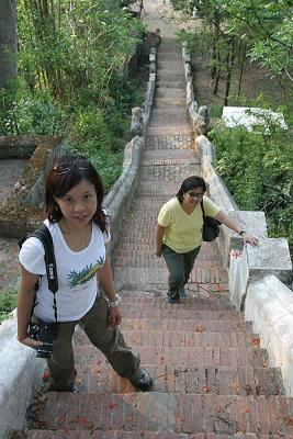 Joyce and Noon at stairs up Phu Si (Looking Down)