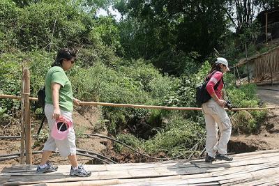 Noon and Joyce at entrance to Ban Xang Hai