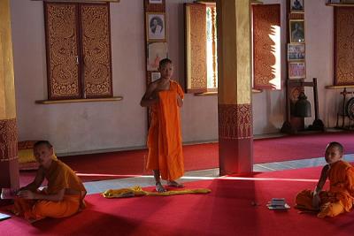Monks inside Wat Saen