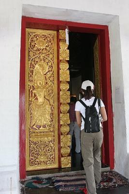 Joyce at Door to Wat Wisunalat
