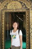 Joyce at entrance to Wat Xieng Thong