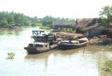 Working on BìNH DƯƠNG River, Viet-Nam