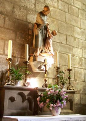 Statue and Lilacs at Side Altar at Notre Dame