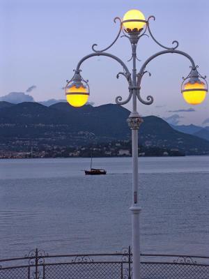 Promenade lights at sunset in Stresa