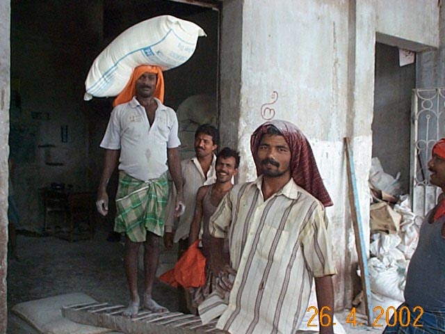 WORKERS AT THE FLOUR MILL