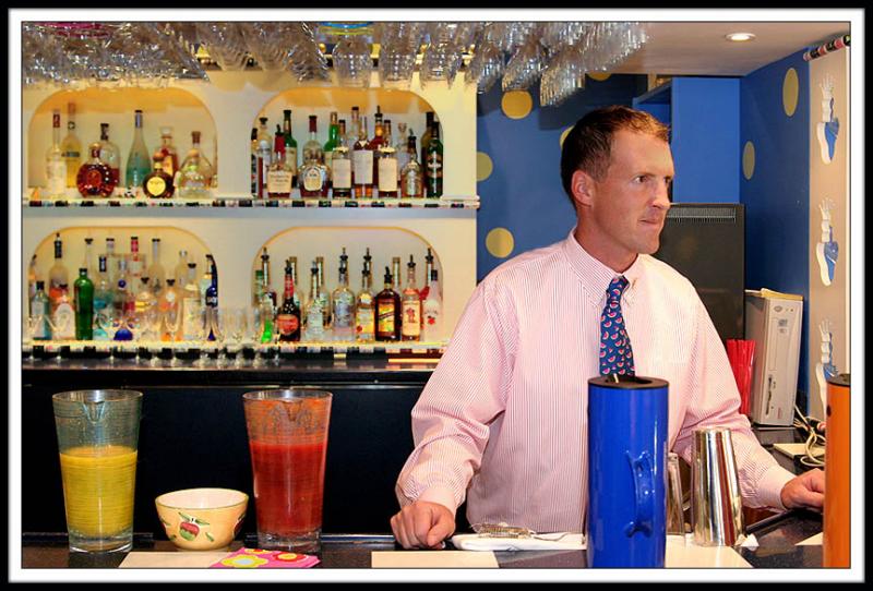 Waiting for Customers at the Back-Lit Bar