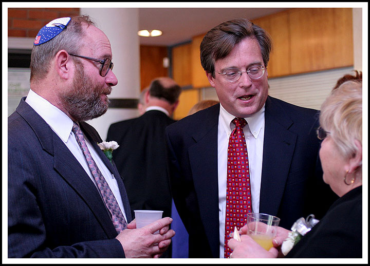 The Mayor Schmoozes with Rabbi and his Wife