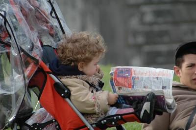 Baby & a news paper