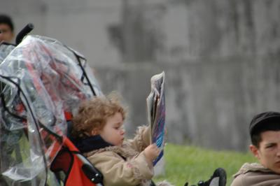 Baby & a news paper