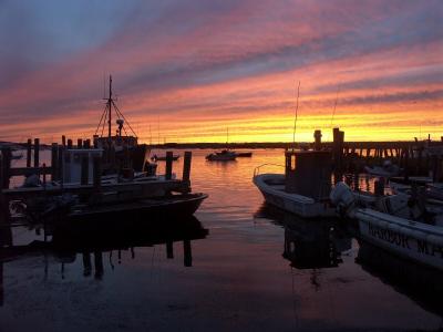 Boats at anchor by Richard B