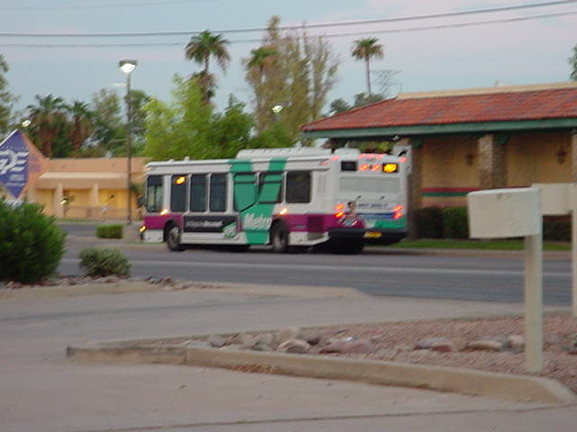 a bus waiting for riders in the morning