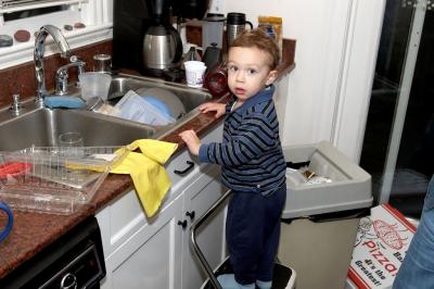 Isaac doing dishes?