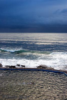 Collaroy storm with lone swimmer