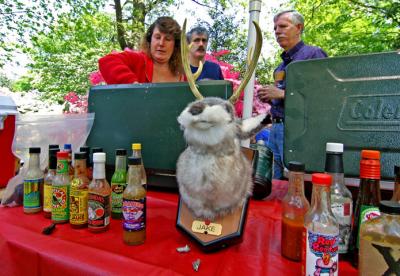 Team Jackalope member Janet Crowe stirs the pot while Pat Crowe and Bill Ridgely chat.