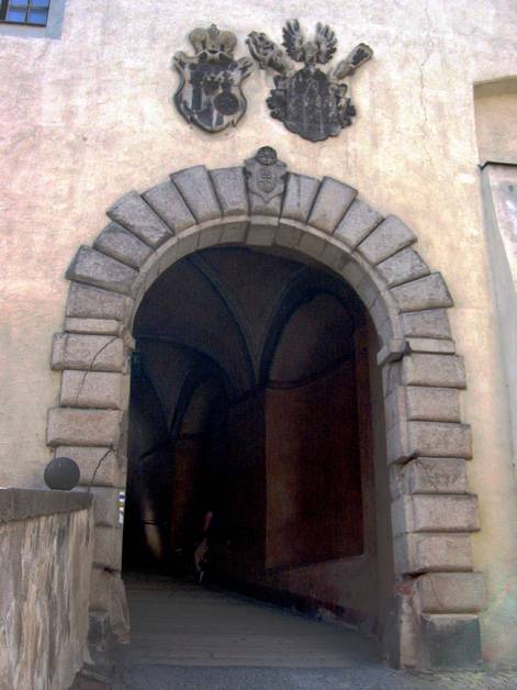 Coats-of-arms above entrance passage to 3rd courtyard of Cesky Krumlov Castle