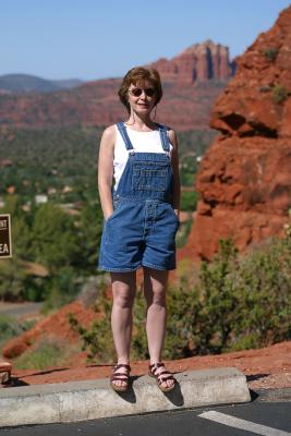 Charlotte standing in the parking lot of the Church of the Holy Cross in Sedona, Arizona.