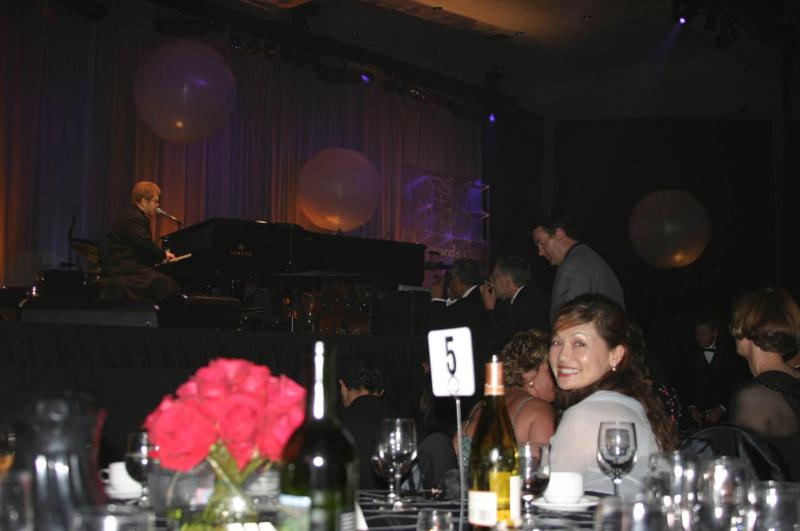 Chloe at our Table and Elton John on stage. rJPG.jpg
