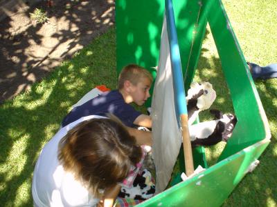 Jacob helping with the puppet show