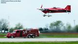 Aerobatic  Aircraft  losing  race  to  Hawaiian  Fire  Depts  rocket  powered  fire  truck  (#3728)