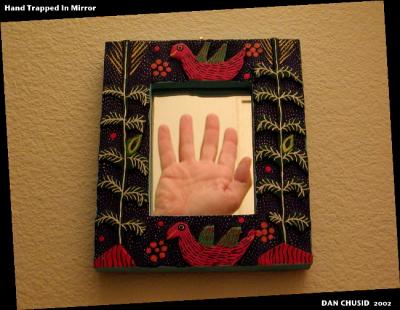 Hand Trapped In Mirror<br><br><br><br>