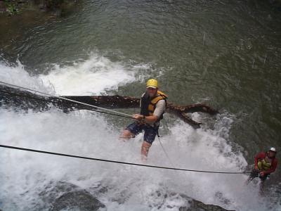 Rapelling down waterfall