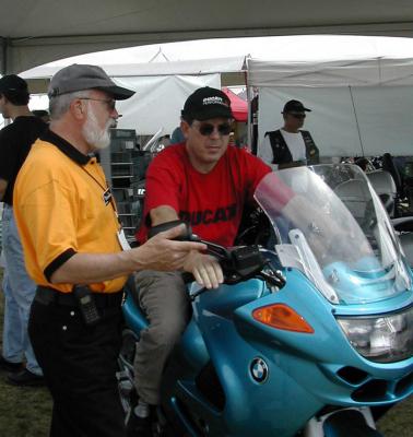Ed at work, discussing the K1200RS with a Ducatista