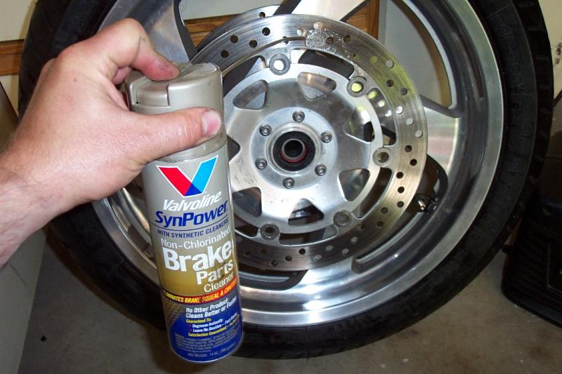 Here I use brake cleaner to clean the rotors photo - fred harmon photos