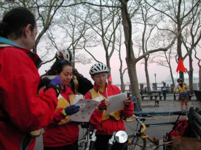 Marshal Captains Stacey Lieberman and Trudy Hutter reviewing the plan before riding to post with the Start Line A Marshal Team.