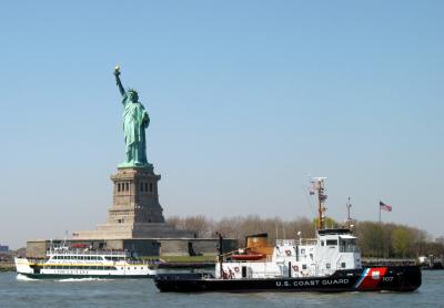 Ferry going to island, boat protecting the Ms.