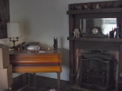 a piano and a gas fireplace